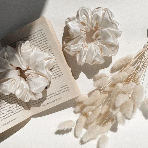 Why Silk/Satin Scrunchies Are Your Hair's New Best Friend: A Luxurious Way to Prevent Breakage and Boost Hair Health